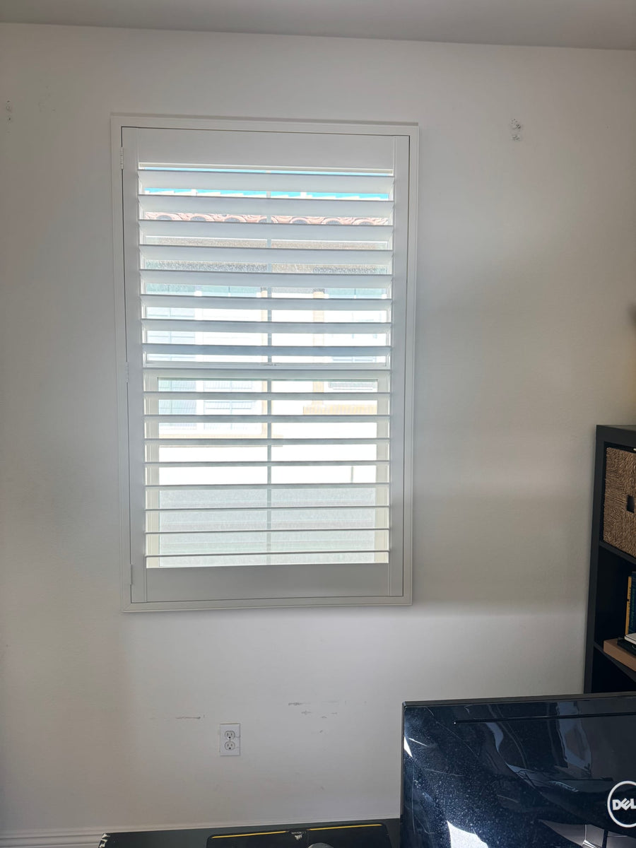 Close view of a shutter panel showing louver spacing and flush frame