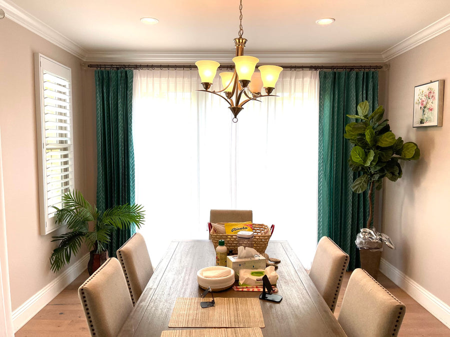 Bright afternoon light diffused through the sheer panels