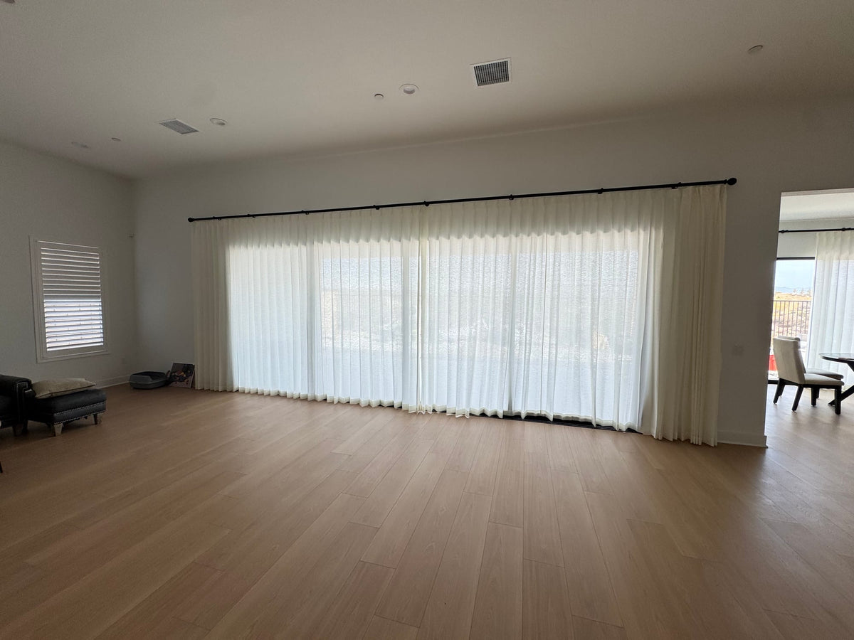 Soft Sheers Across Wide Glass