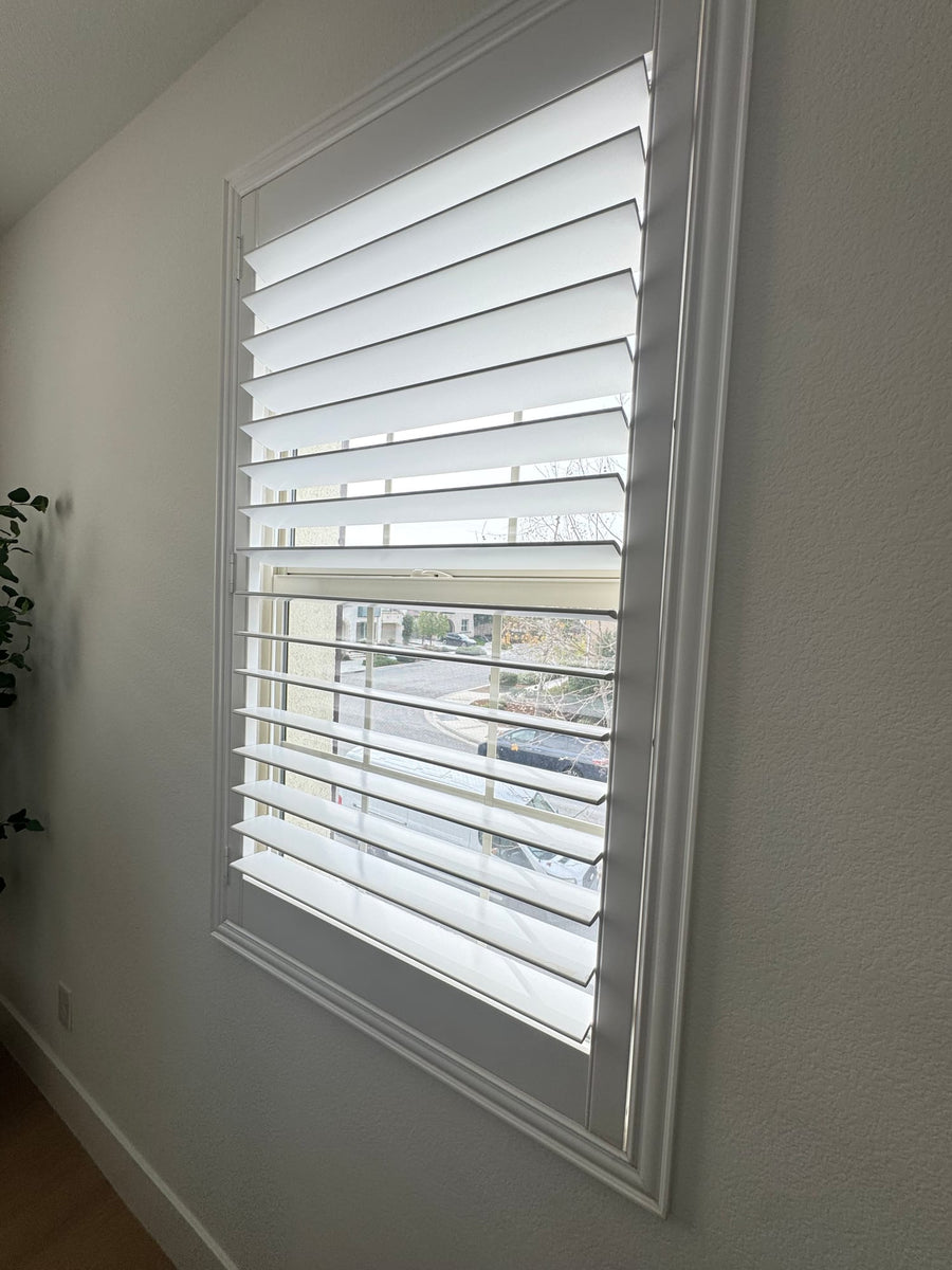 Quiet Light Through White Shutters